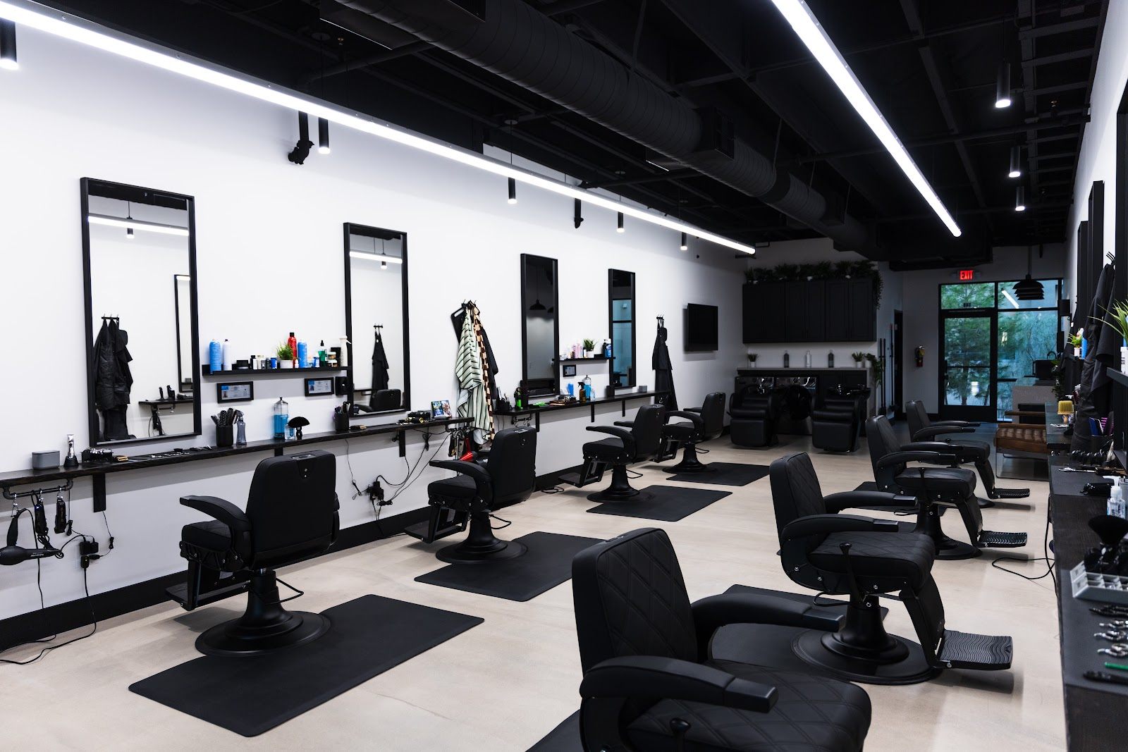 The clean black-and-white salon floor at BLEND in Henderson