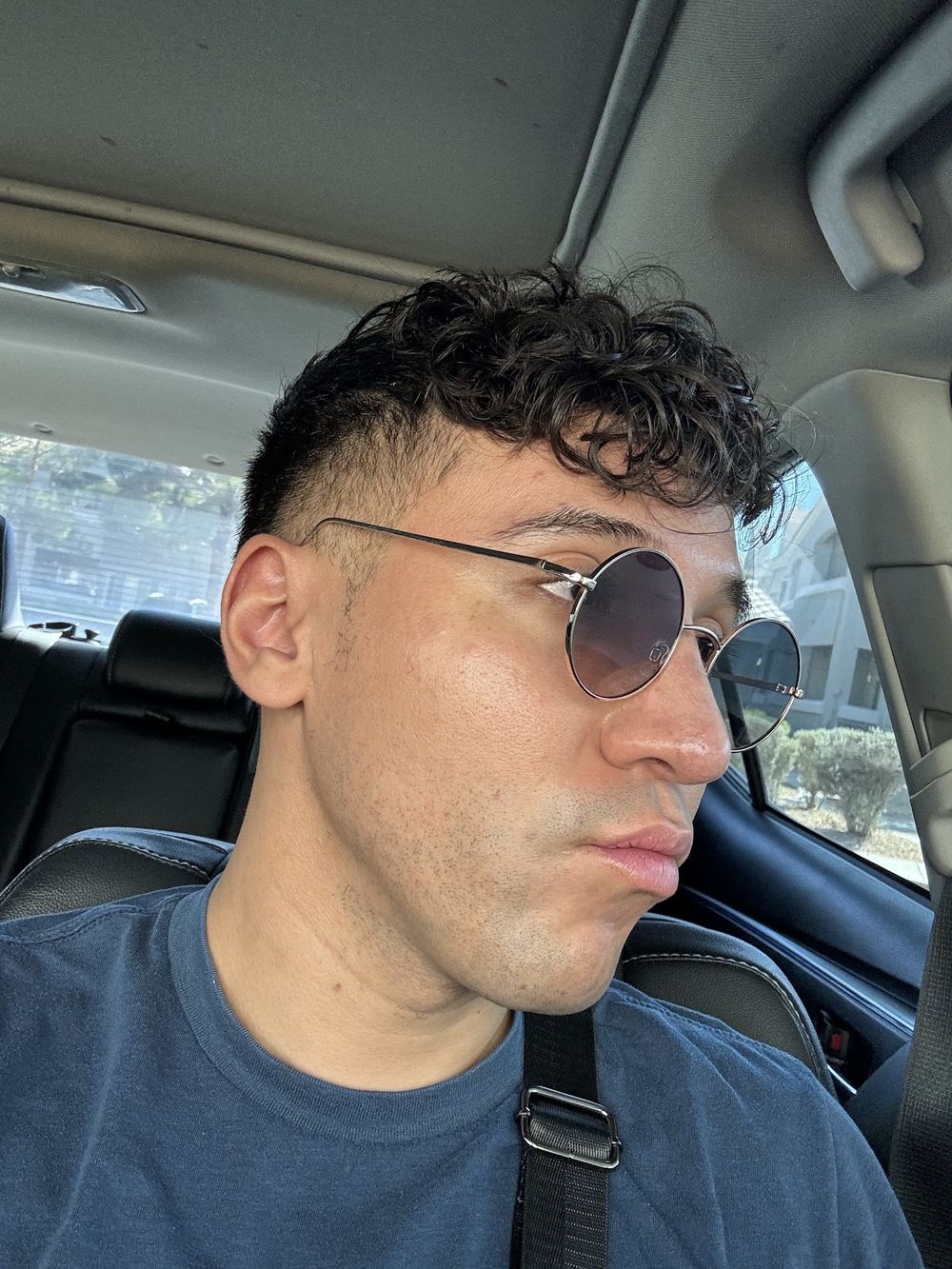 Curly top with clean sides