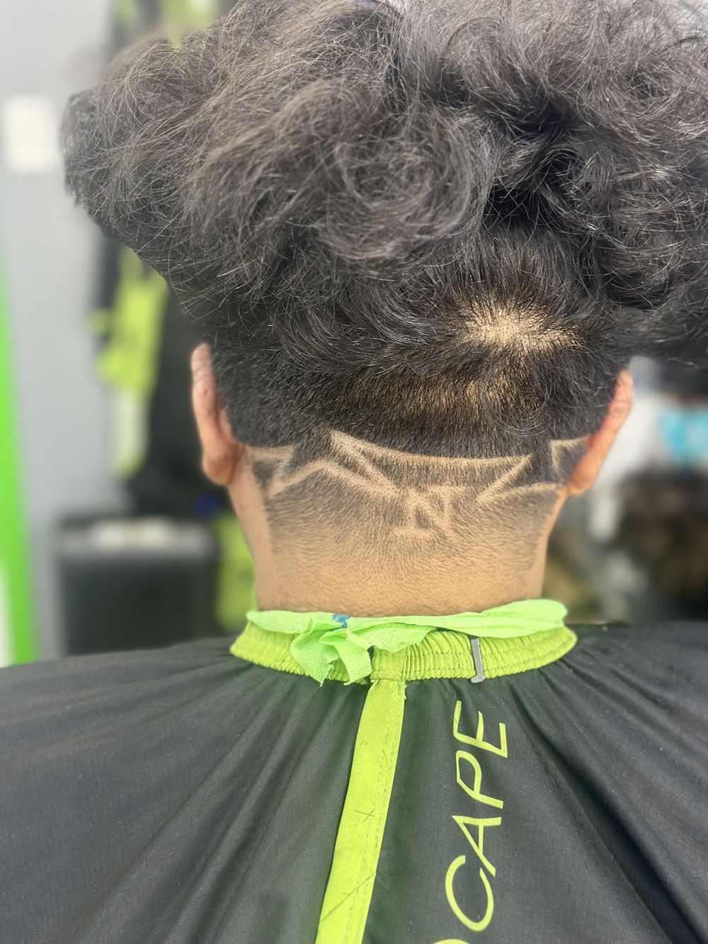 Star design cut into the nape