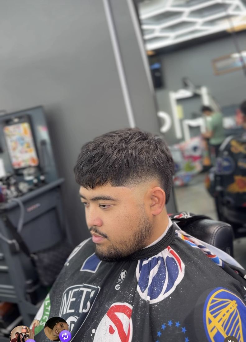 Curly top with a skin fade