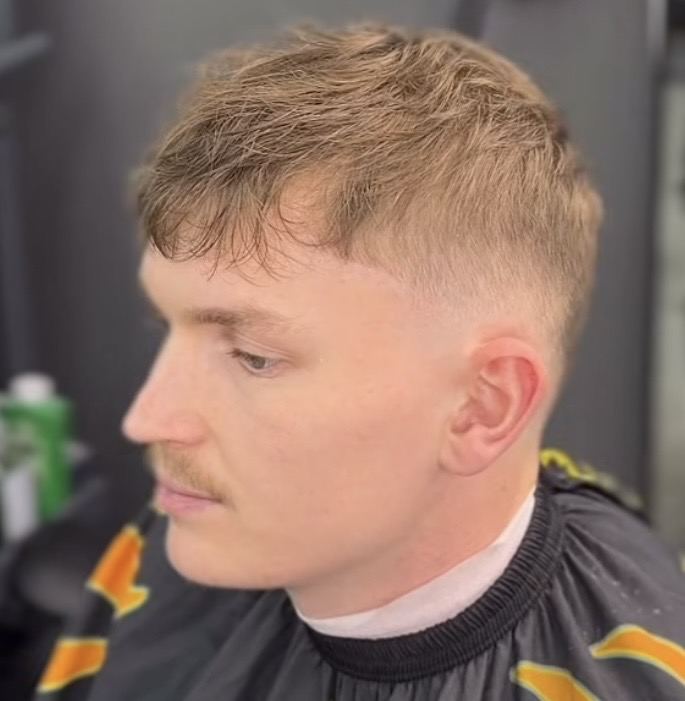 Textured fringe and clean mustache line