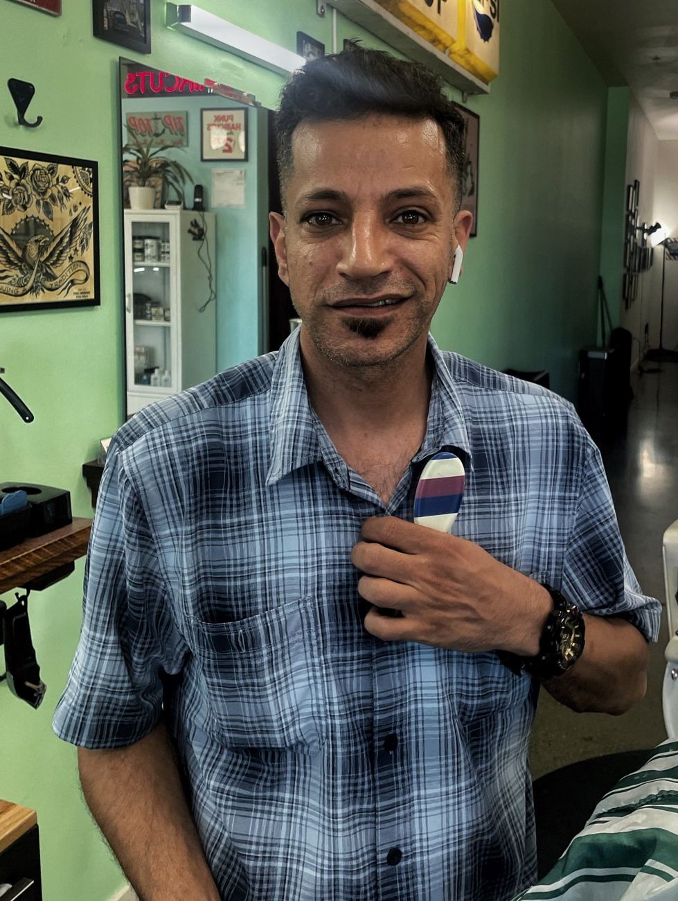 A happy client after his cut at Dexter Ave Barbers
