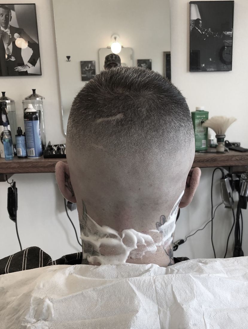 Neckline cleanup with a straight razor