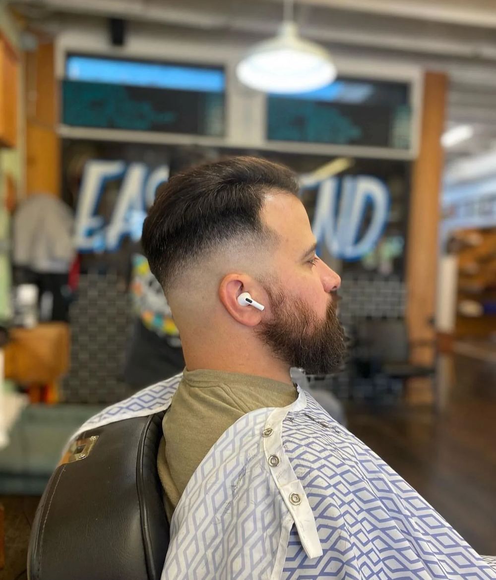 A pompadour side profile