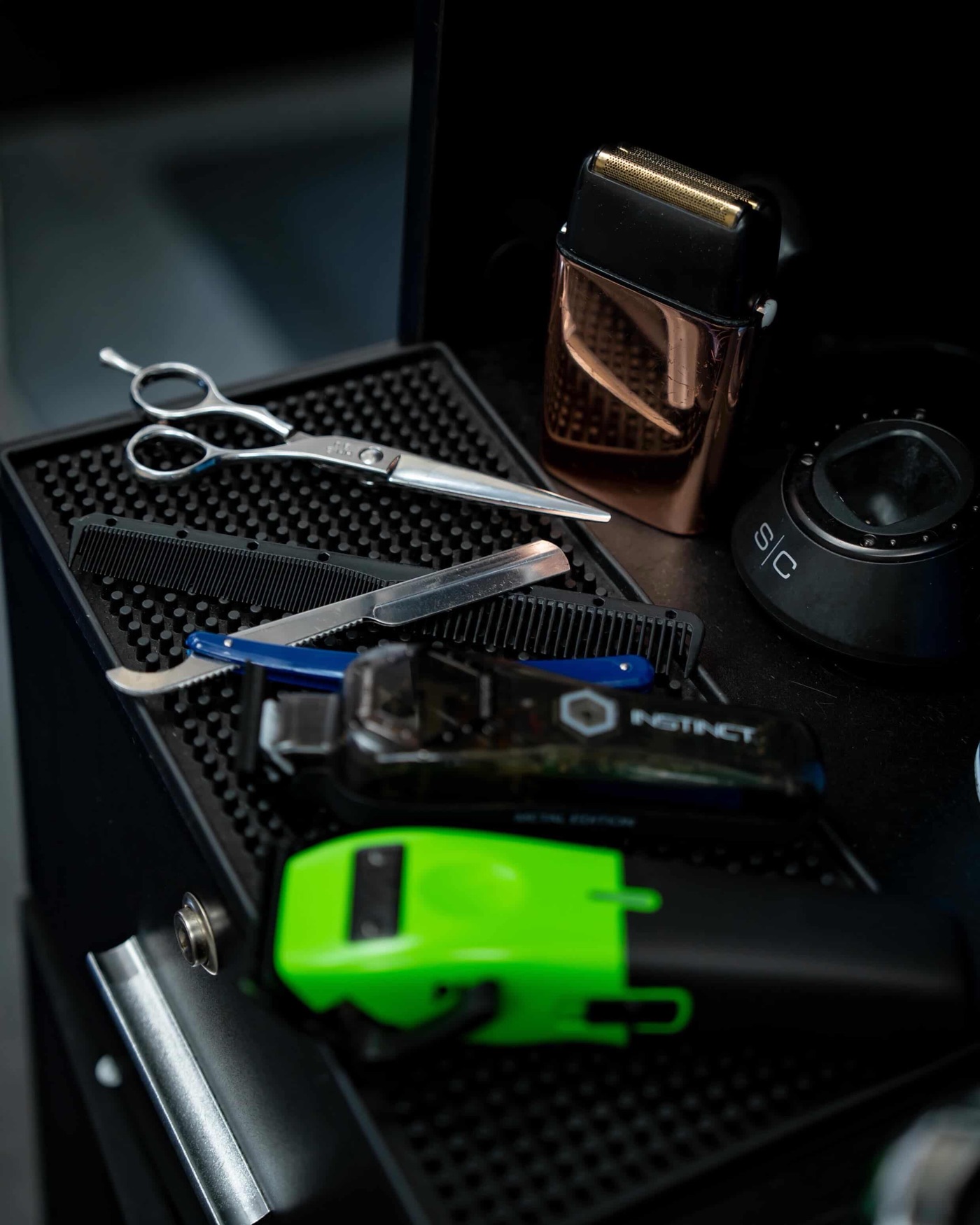 Shears, razors and clippers laid out at the station