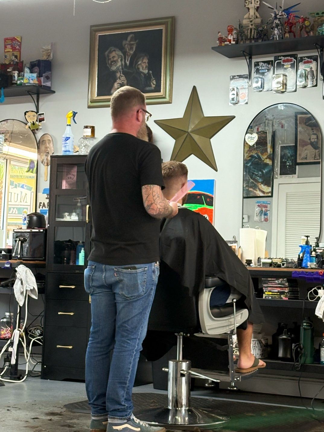 A cut in progress under the gold star at Mama Tried