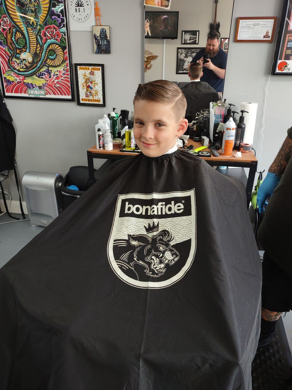 A young client in the Bonafide cape