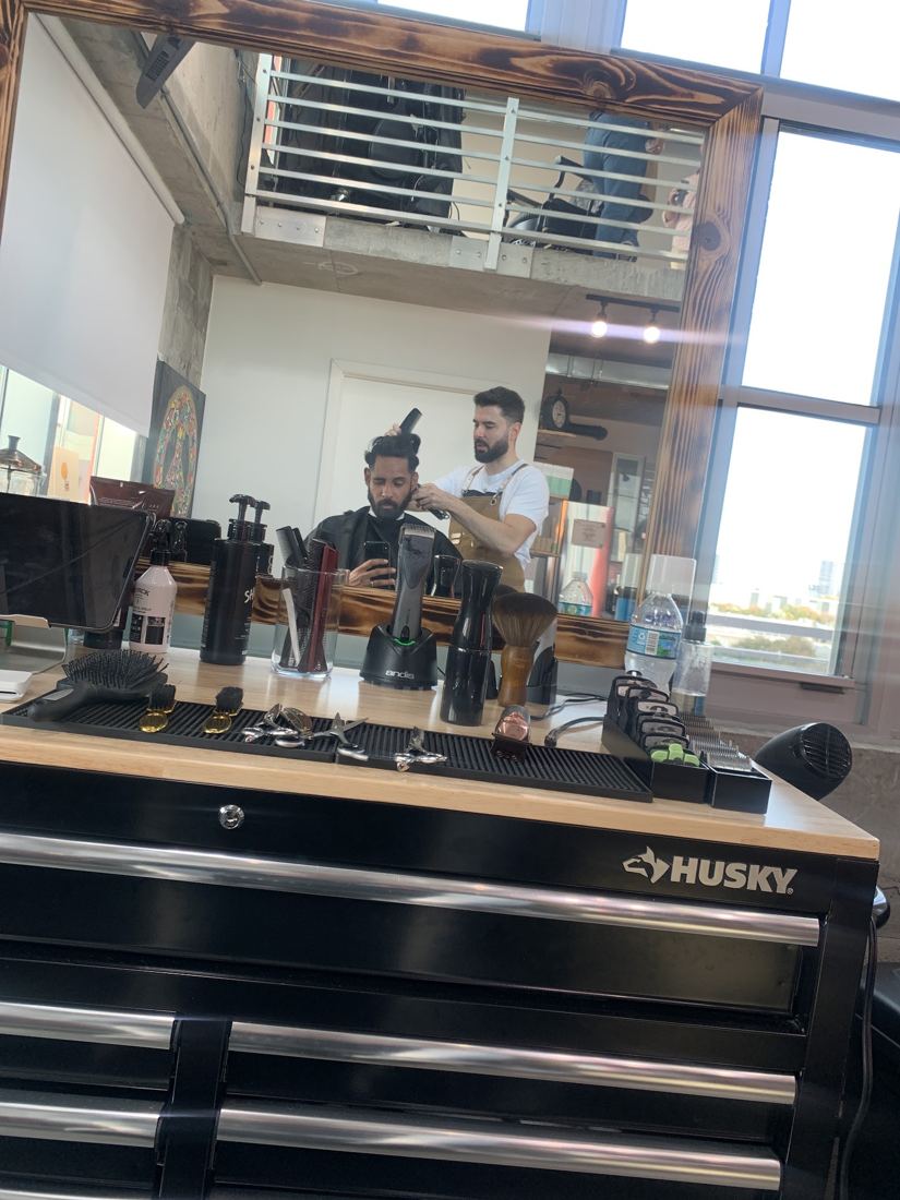 Two barbers working the bench