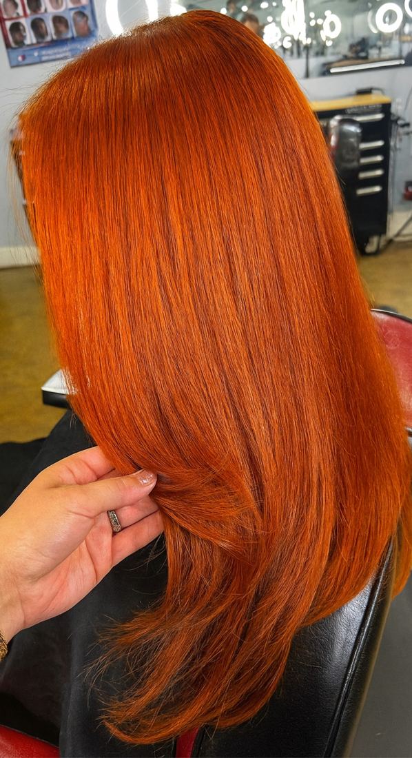 A rich copper color, cut and styled