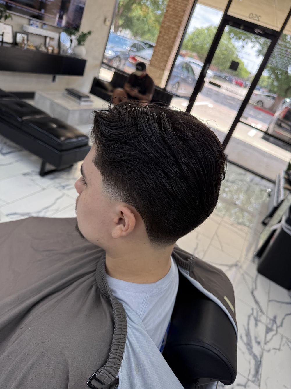 A blow-dried taper