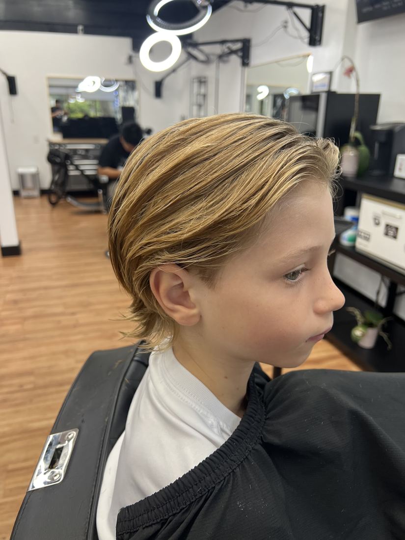 A young client's fresh cut