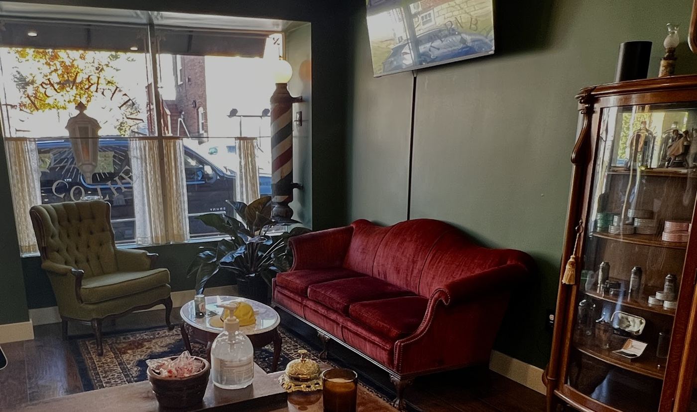 The red velvet couch in the lounge corner